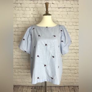 Loft short sleeve blue top with embroidered roses. Never worn. Size L.